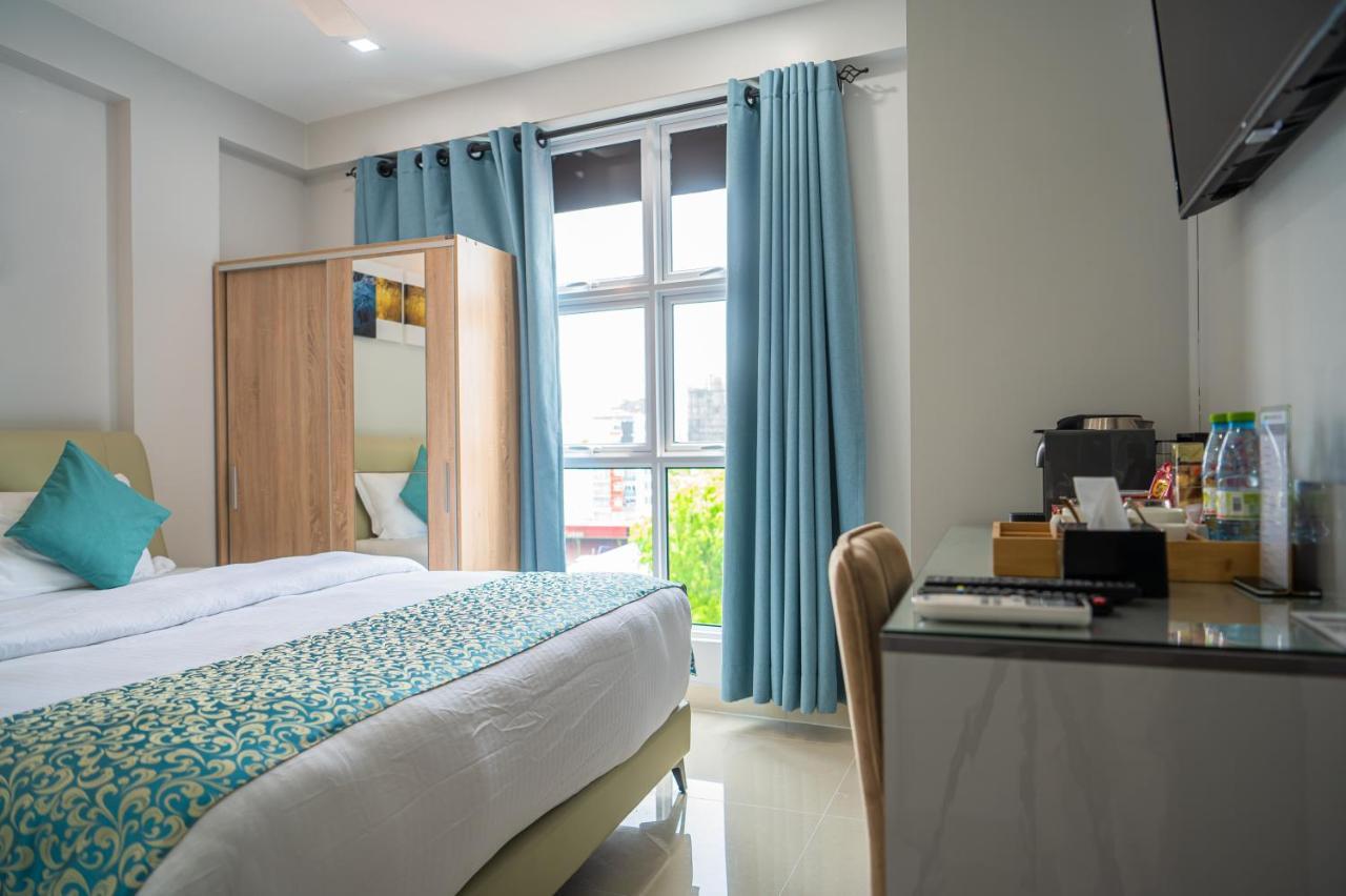 Tour Inn Мале Екстер'єр фото
