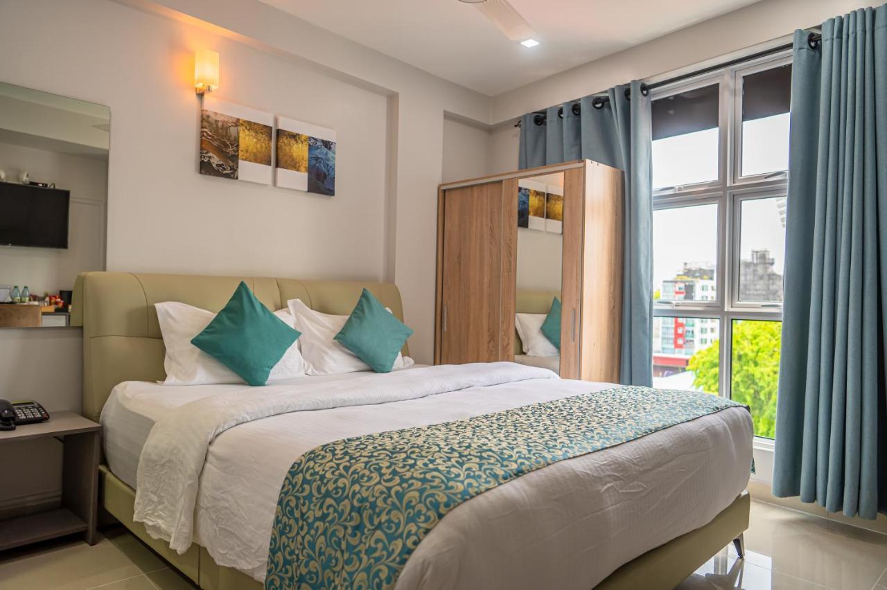 Tour Inn Мале Екстер'єр фото