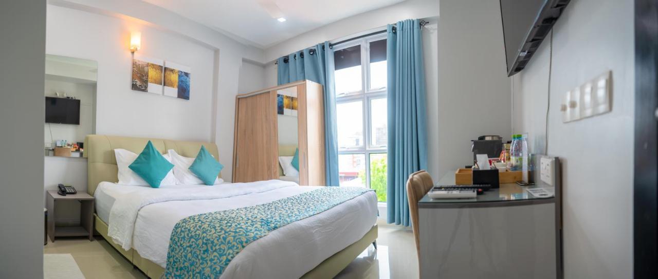 Tour Inn Мале Екстер'єр фото